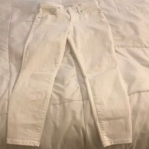 White mid rise pants.